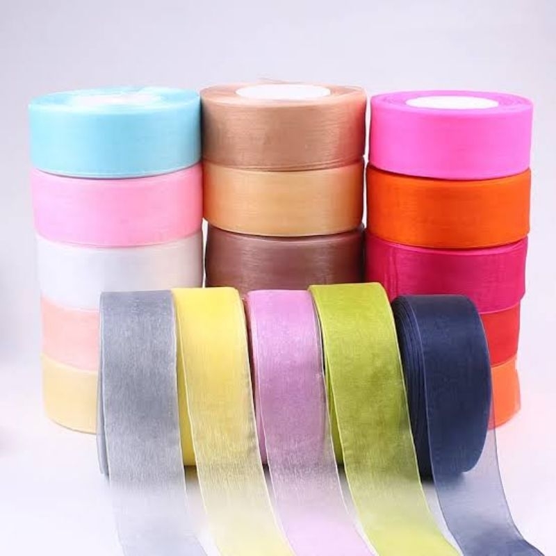 

PITA SATIN ORGANDI ROLL LIST EMAS 1 INCH/Pita Satin 2,5cm PANJANG 25 YARD ( 22 METER)/lis emas/pita transparan/transparent ribbon