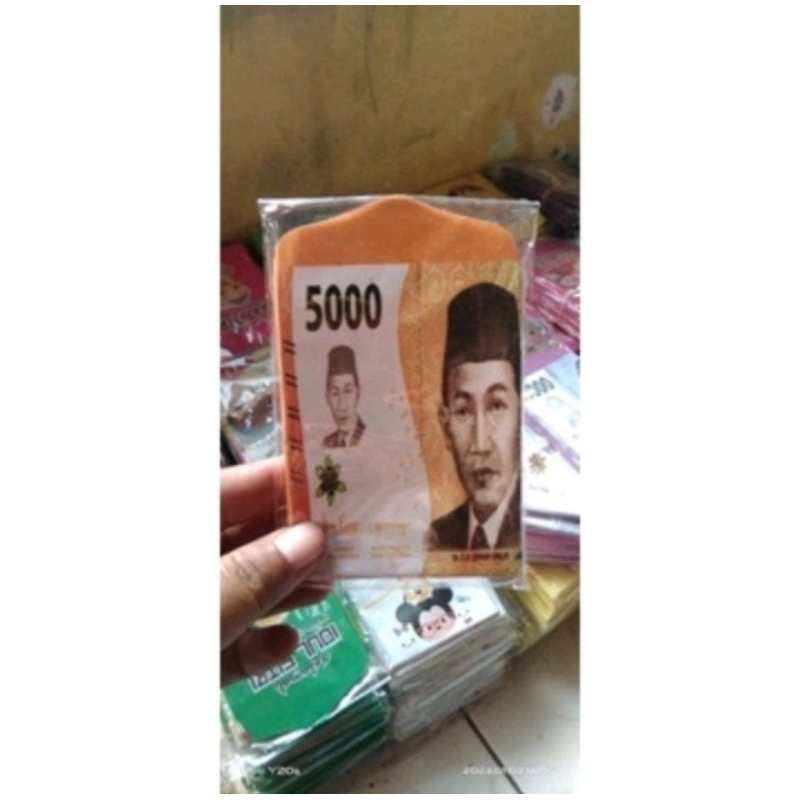 

Amplop lebaran motif uang 5000