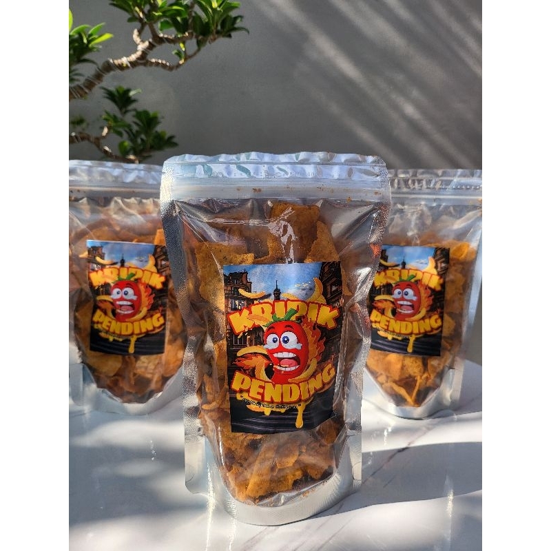 

KERIPIK / CAMILAN PEDAS (PENDING) TERBUAT DARI JAGUNG TORTILLA PEDAS GURIH