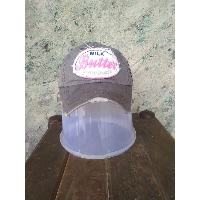 TOPI RIPPED/RIPPED CAPS MILK BUTTER CHOCOLATE