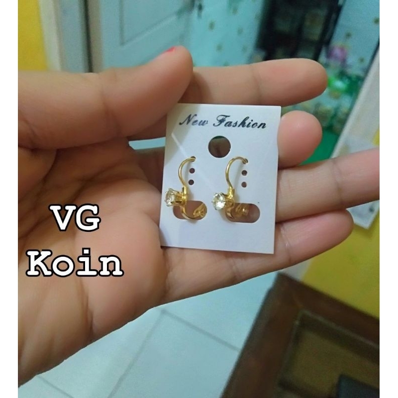 anting koin91 mata Putih