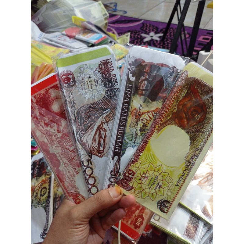

Amplop lebaran motif uang jadul ukuran jumbo isi 10 pack