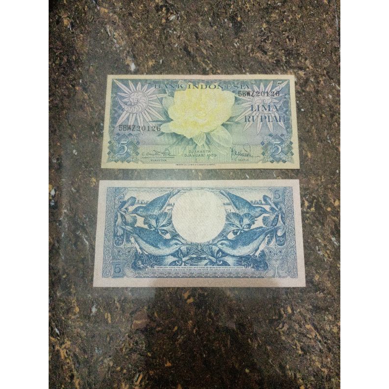 uang kuno seri bunga