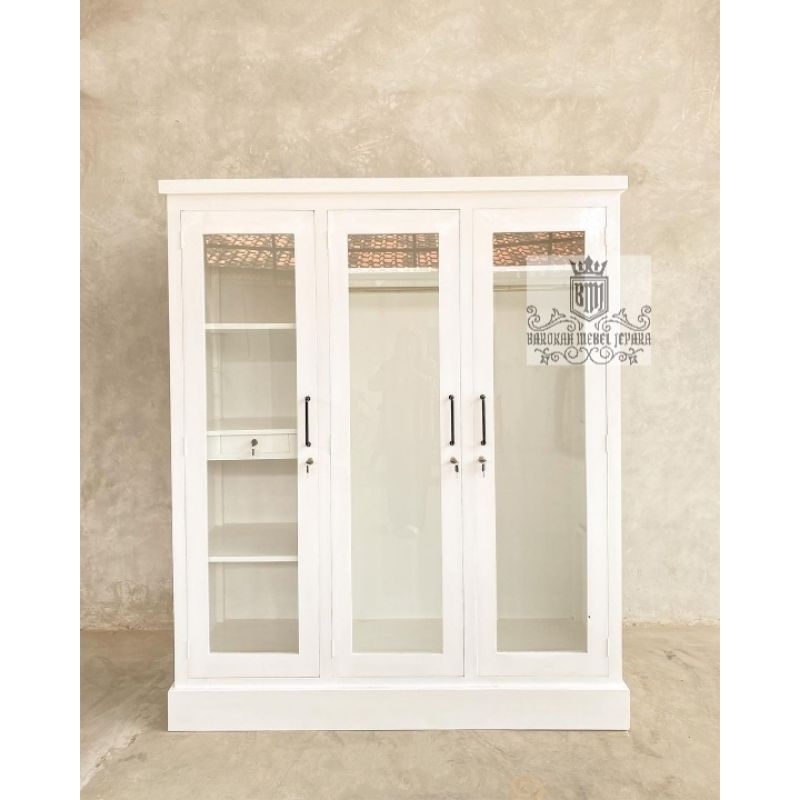 Lemari pakaian kayu jati finishing warna putih pintu full kaca bening Pintu 3