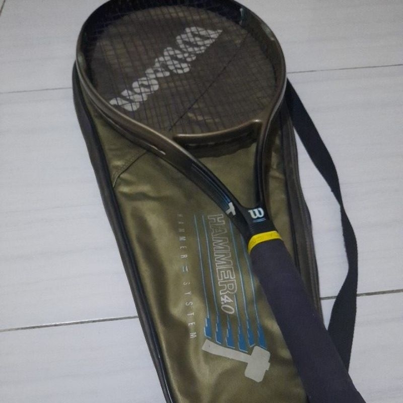 Raket tennis wilson hammer 4.0 plus sarungnya