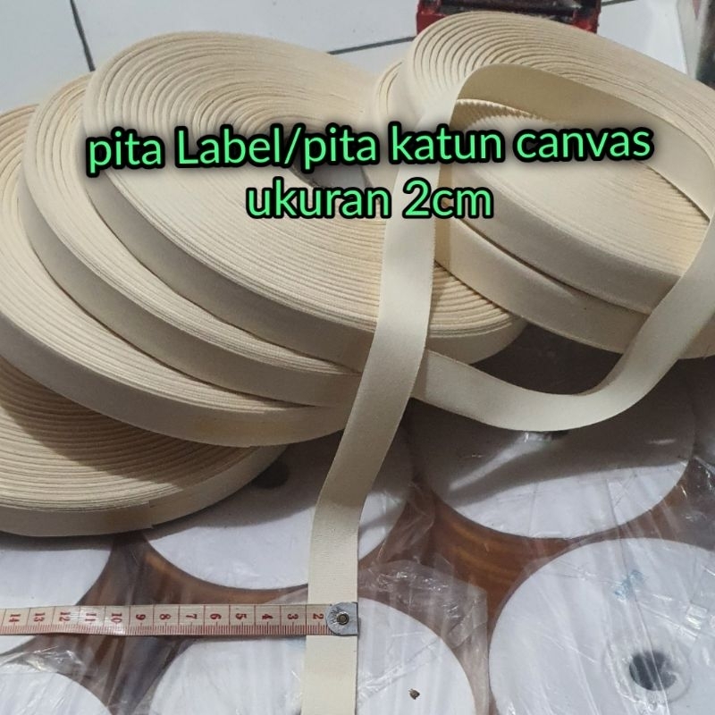 

Pita label/pita canvas katun 2CM & 1,2cm dijual per rol isi 100mtr/Bahan halus dan lembut