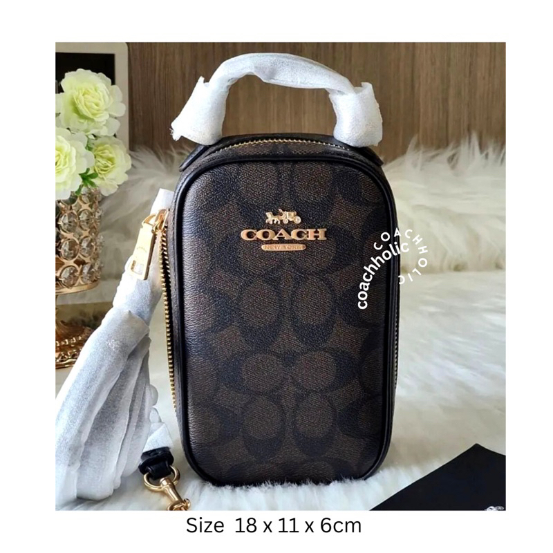 coach eva phone bag original