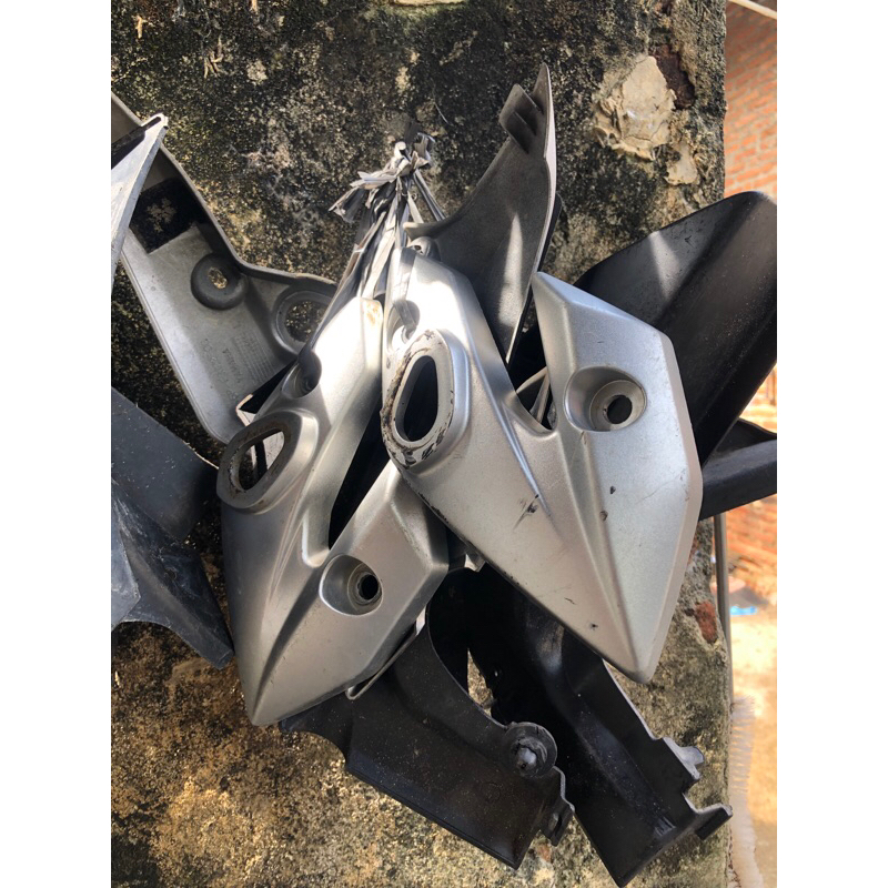 kupingan headlamp vixion old