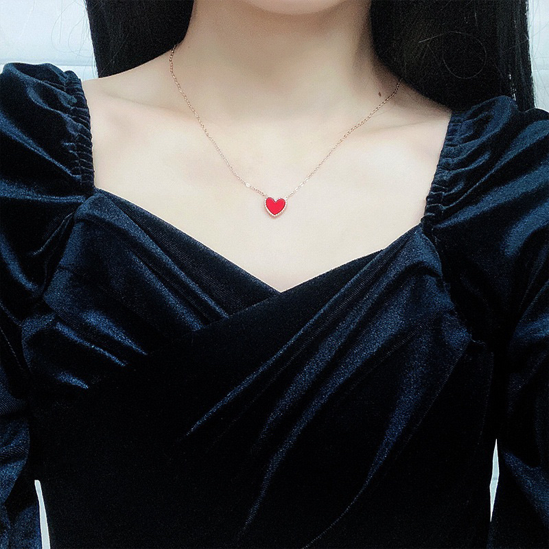 kalung hati merah titanium simple