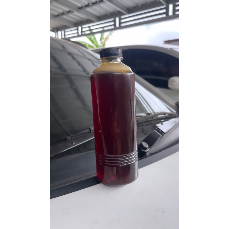 

Madu kelulut warna hitam original asli ukuran 500ml