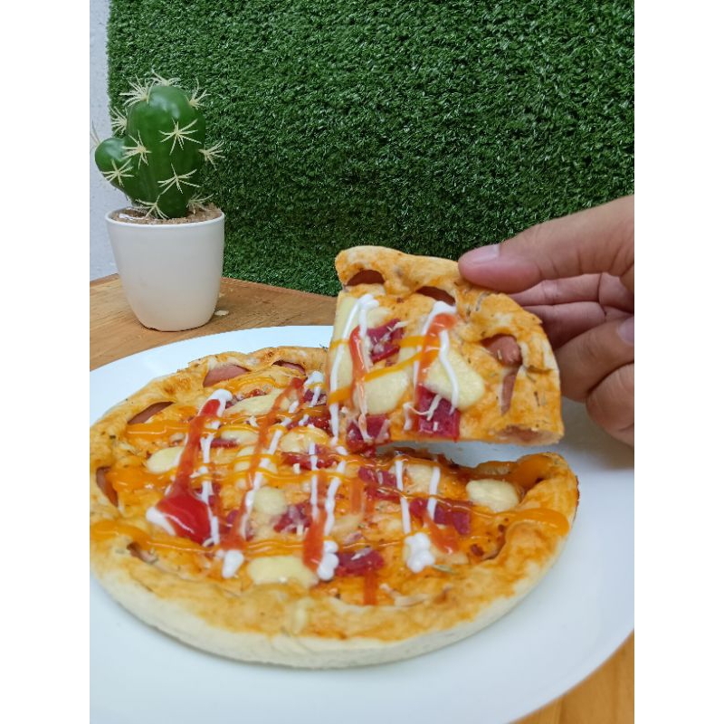 

Pizza yummy jumbo,murah harga terjangkau dengan topping dan keju yang melimpah