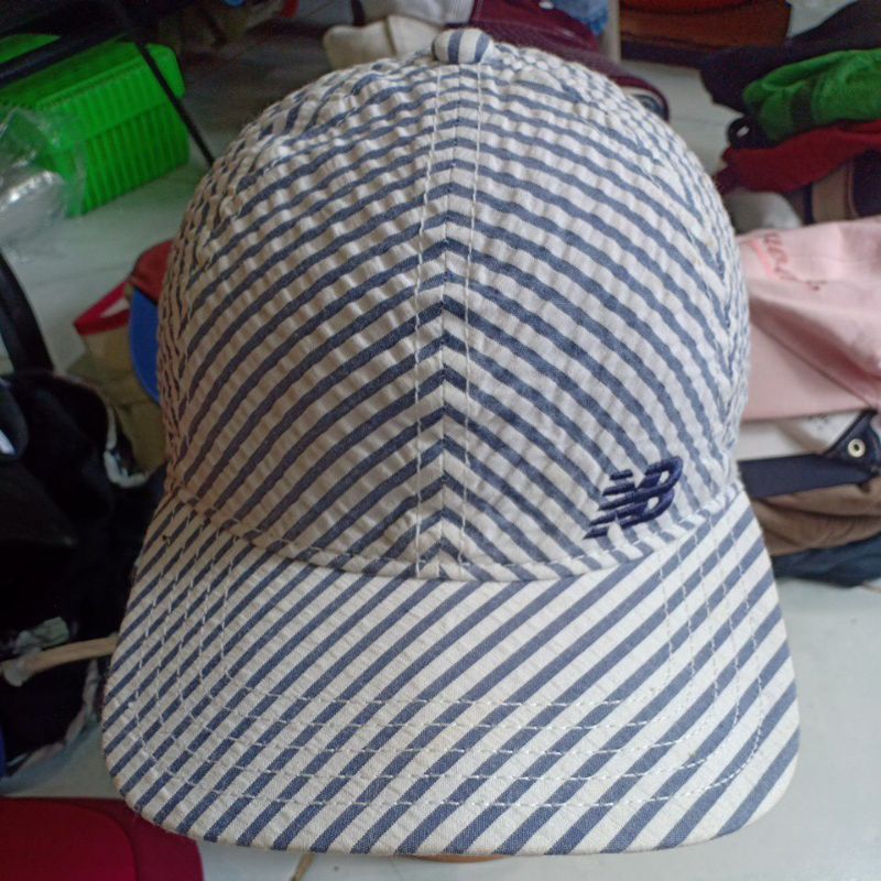 topi second New balance ladies