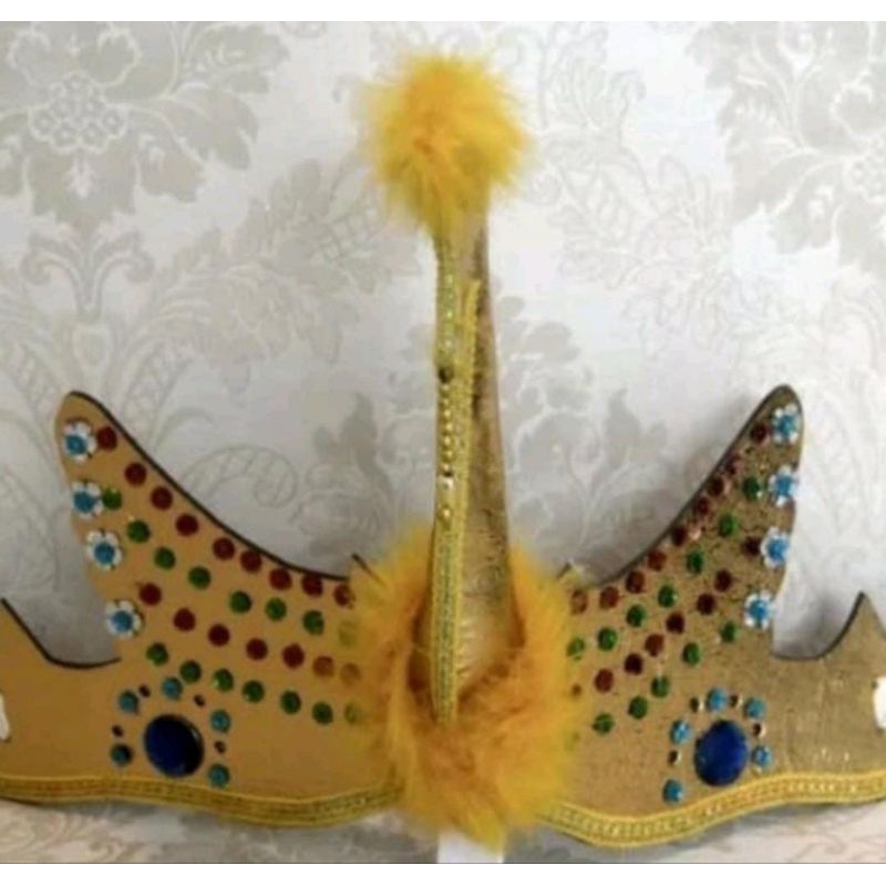 MAHKOTA BURUNG TARI MERAK
