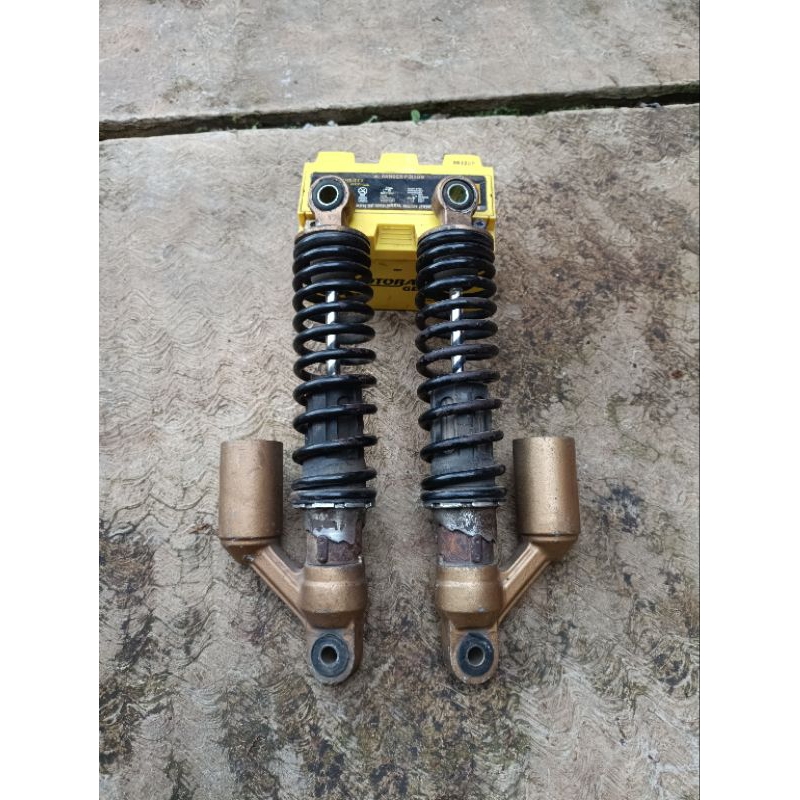 shock belakang tiger revo copotan original