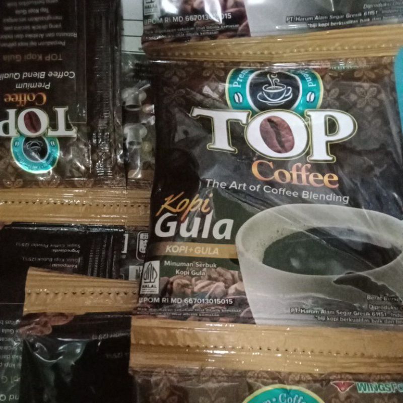 

Top coffe,kopi dan gula.kemasan sachet,1 renceng isi 12 sachet