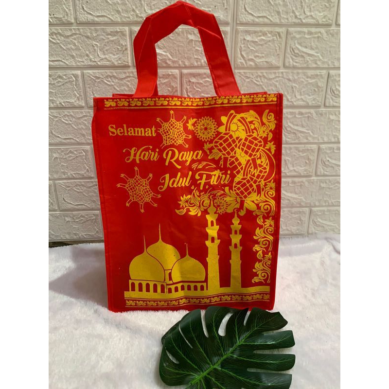 

Tas Lebaran murah tas spunbond tas hajatan tas parcel tas IdulFitri tas hampers Lebaran