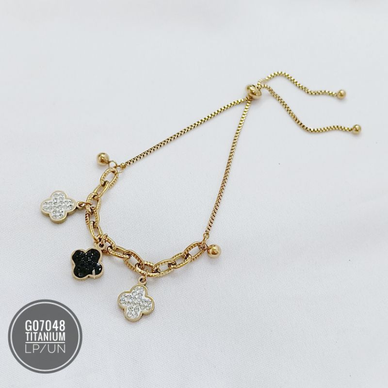 Gelang Serut Titanium jurai Clover hitam putih permata gold G07048