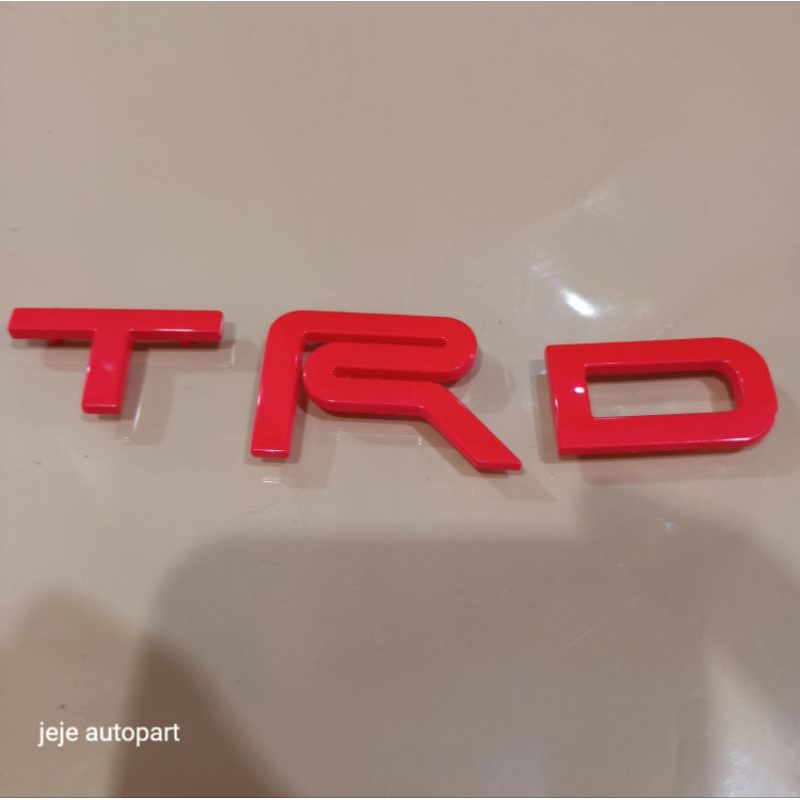 emblem TRD merah grill depan TOYOTA FORTUNER original 100%