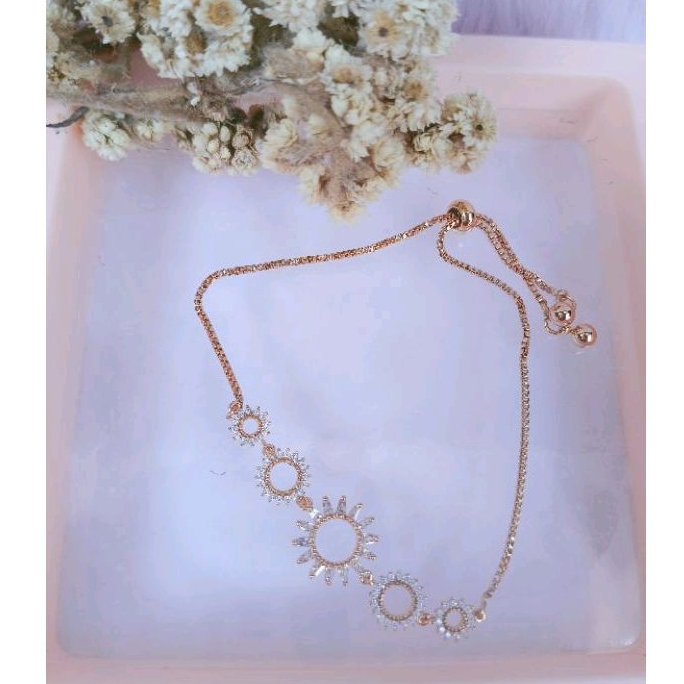 Gelang serut xuping motif matahari mata putih Gs0045