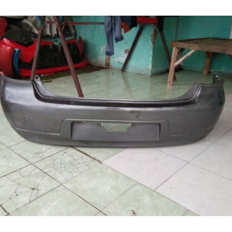 bumper belakang grand livina 2010