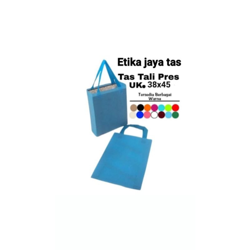 (1Lusin = 12 pcs) tad spun bond press / goodie bag press tas handle 38x45 x 8 harga di atas adalah harga per lsn