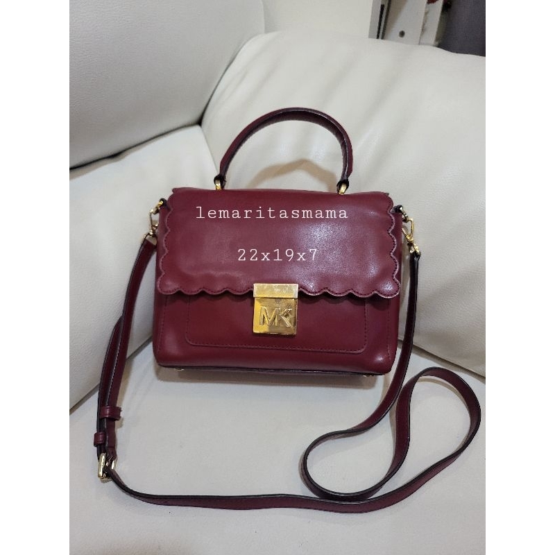 Mk mindy maroon sling bag