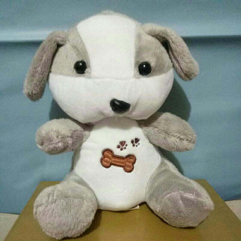 Boneka anjing abu abu tulang