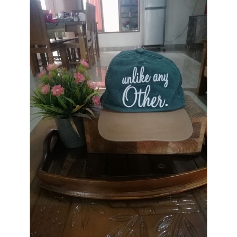 Topi Uniqlo x Pharell William Original