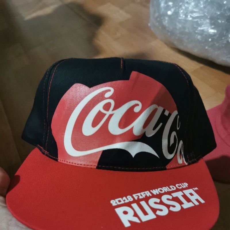 topi coca cola second