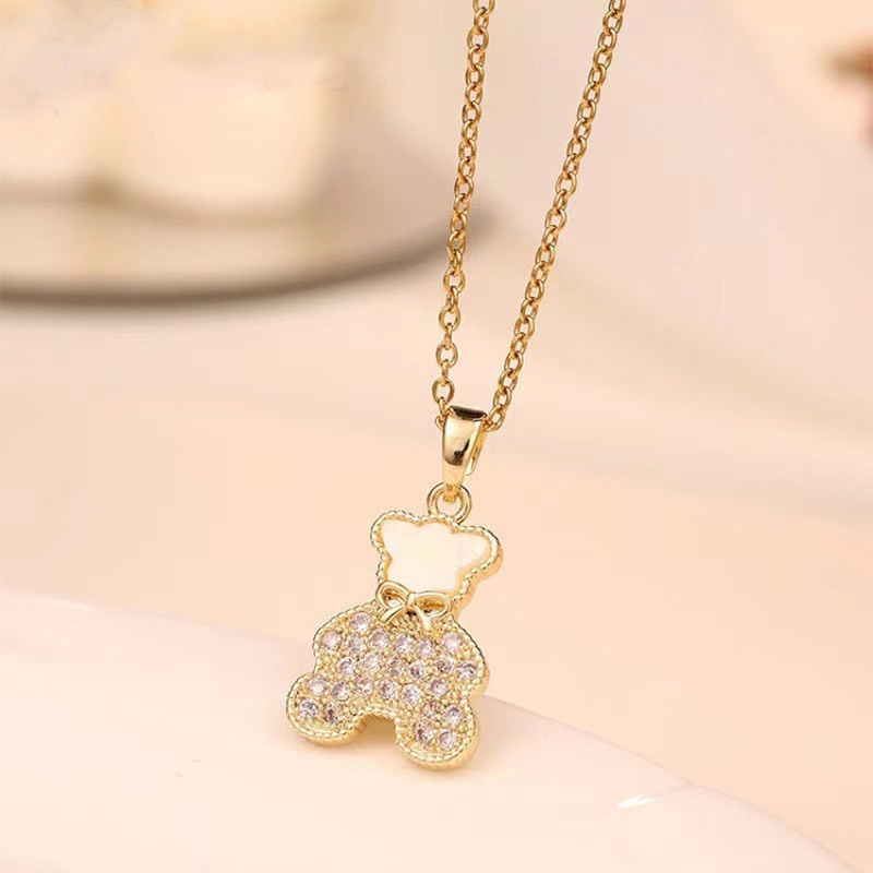 kalung teddy titanium asli