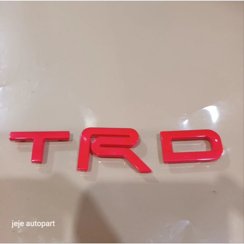 emblem TRD merah grill depan TOYOTA FORTUNER original 100%