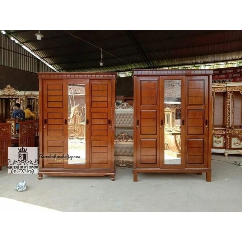 lemari pakaian berkaki jati pintu 3 sleding