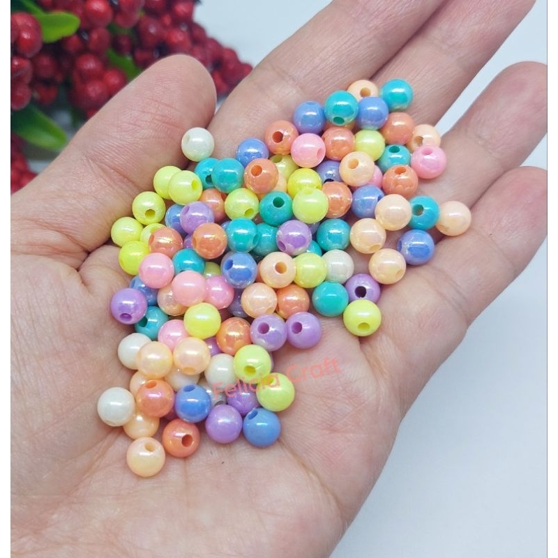 +/- 208pcs. Manik mote pastel AB 6mm