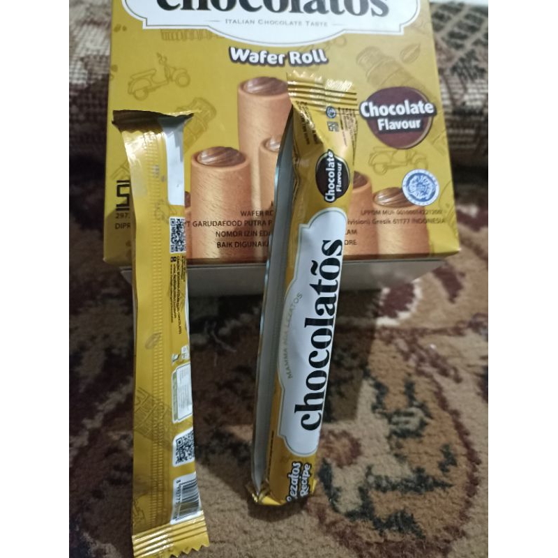 

cocolatos wafer roll per pak 9.950 per biji 450