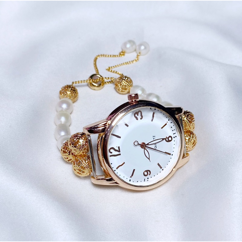 Jam tangan model serut mutiara air tawar asli lombok bersertifikat Jam tangan mutiara asli Perhiasan