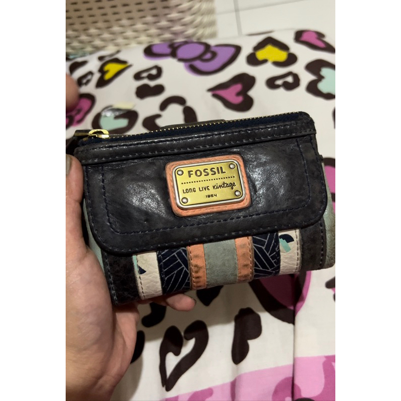PL dompet fossil