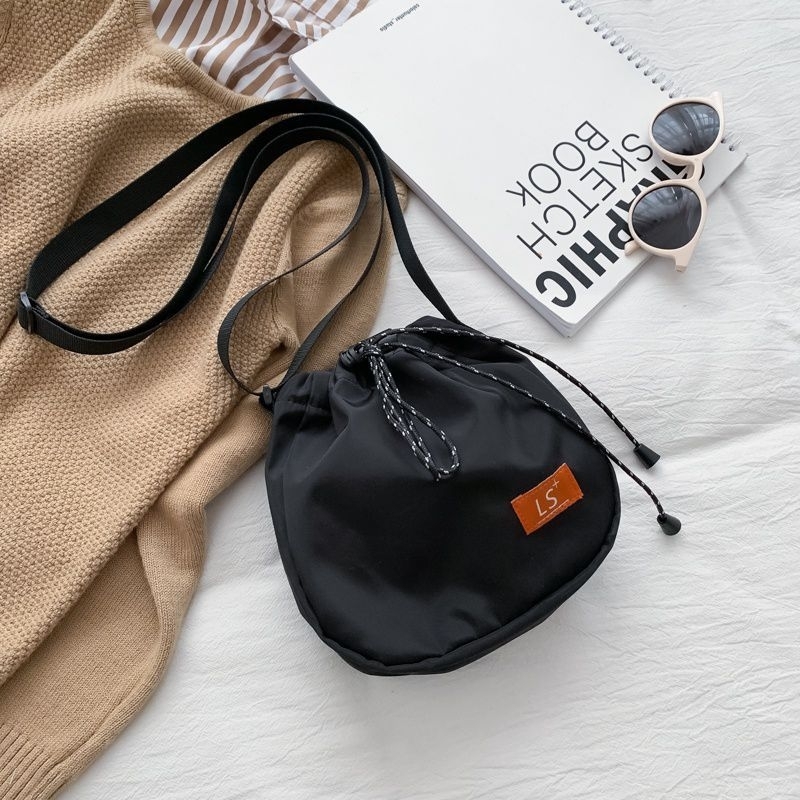 Tas Selempang Mini Bulat Serut Slingbag Fashion Pria Wanita Murah Promo Kanvas