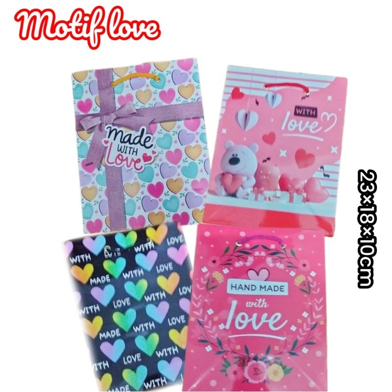 

Paper Bag Glossy Aneka motif ukuran 23×18×10cm
