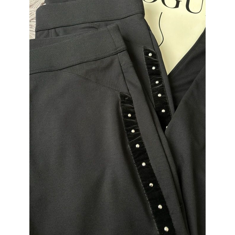 Mau** black studed pants