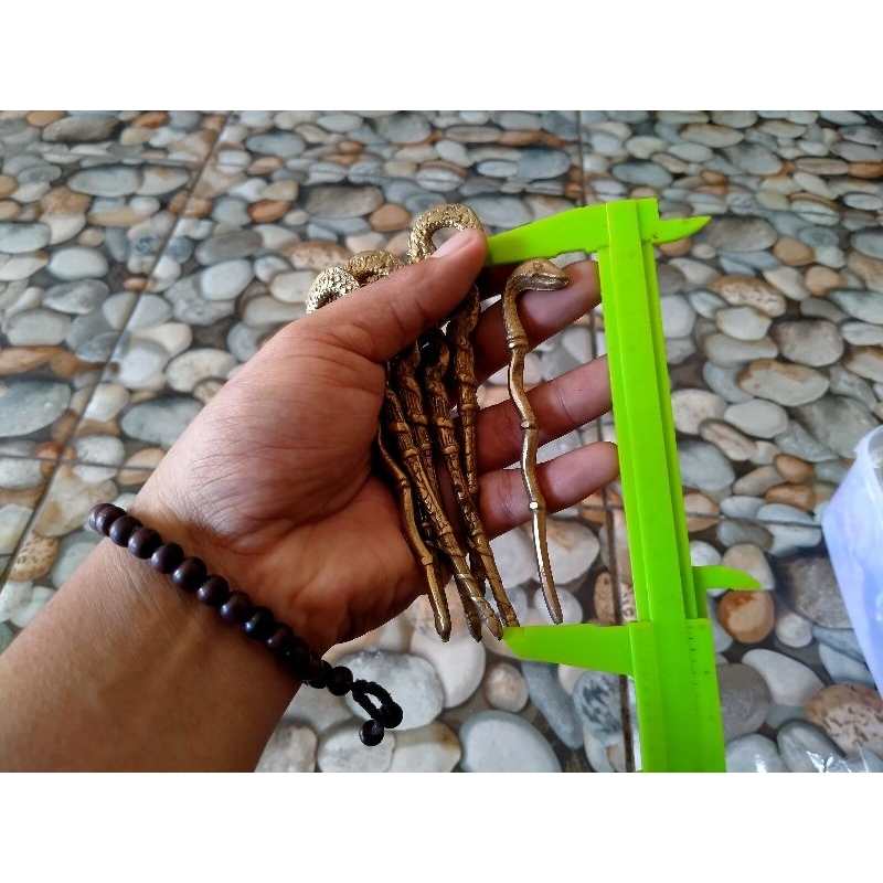 tusuk konde besi kuning ukir