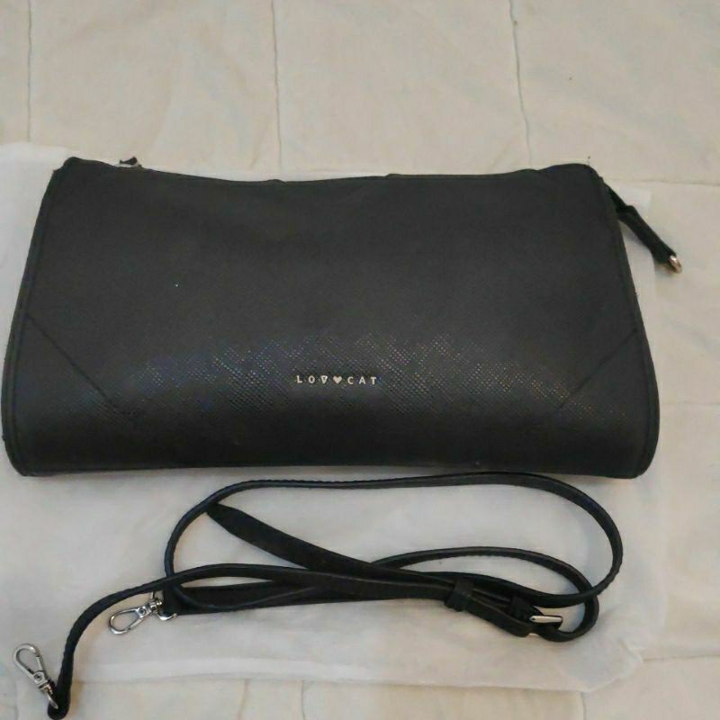 Tas sling pesta lovcat