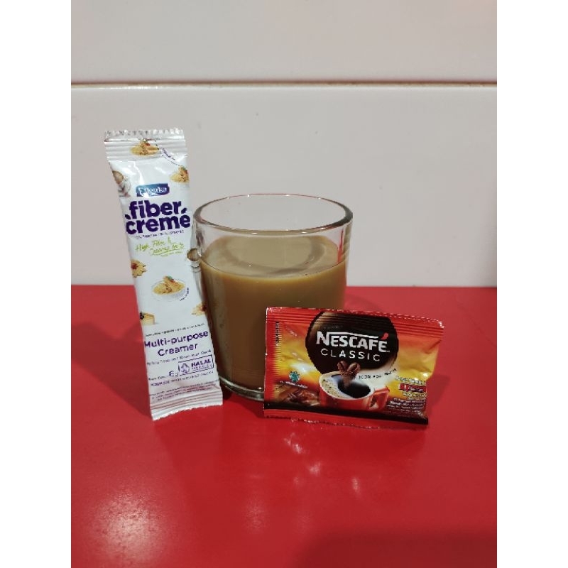 

kopi Nescafe 2 gram (1 sachet) + fiber creme 6 gram (1 sachet) kopi nikmat dan wangi