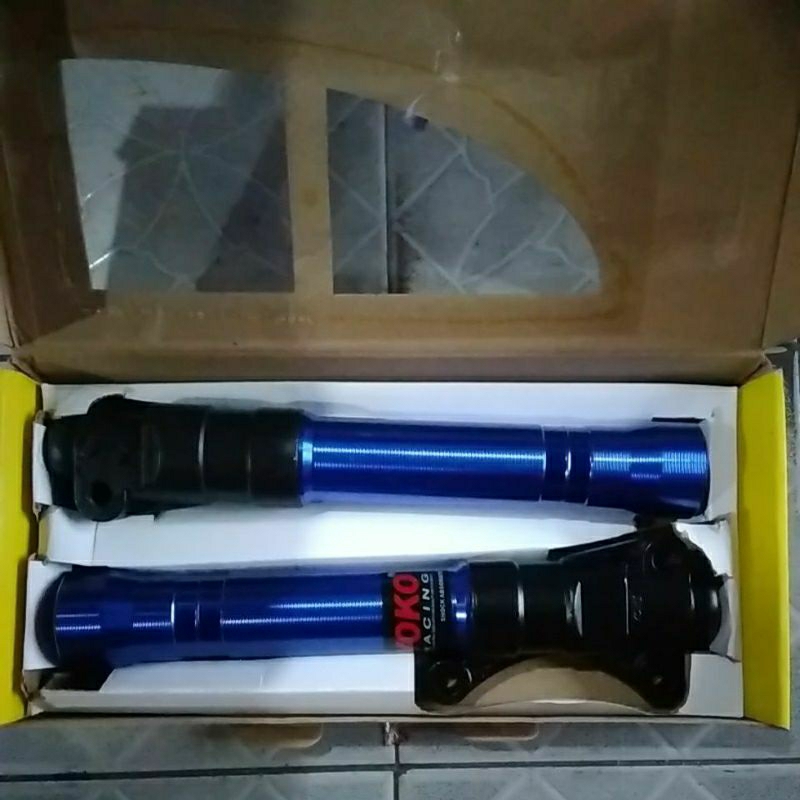 TABUNG SHOCK DEPAN YOKO MIO