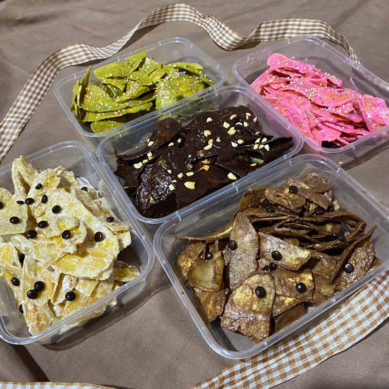 

KRIPIK PISANG LUMER BOX 500ml