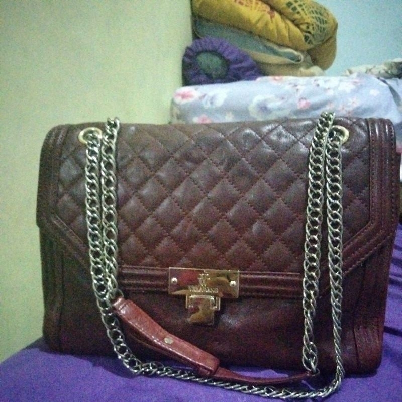 Sling rantai Vera wang