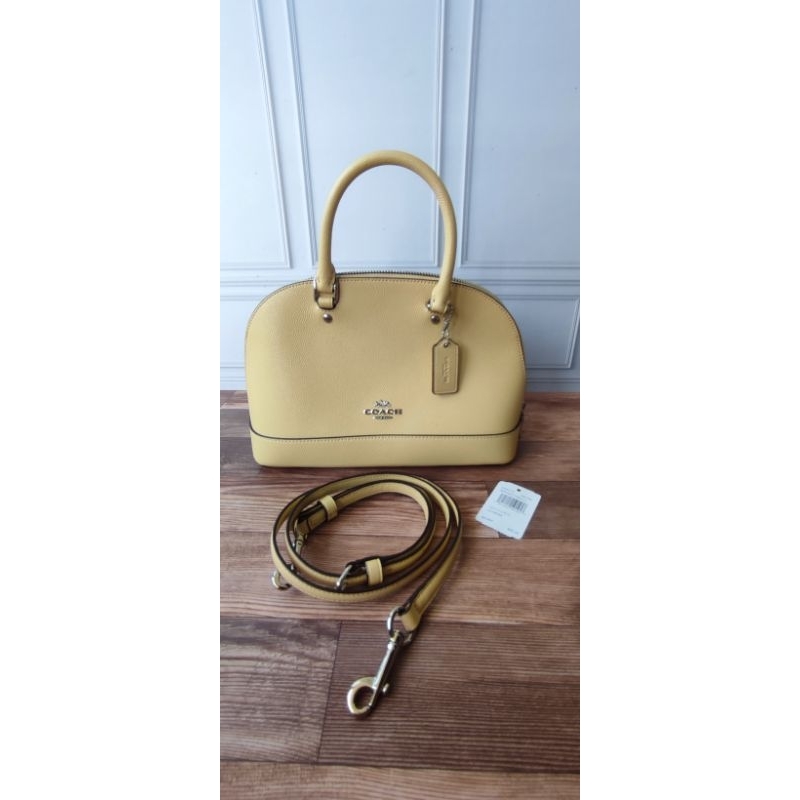 Preloved Coach Mini Sierra Light Yellow size 25 with tag and replacement db