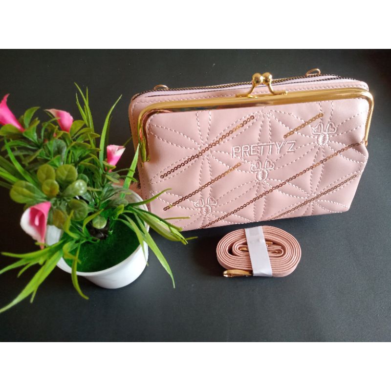 Dompet wanita,dompet behel hp wanita slimbag prety# 156 model terbaru.tas selempang wanita