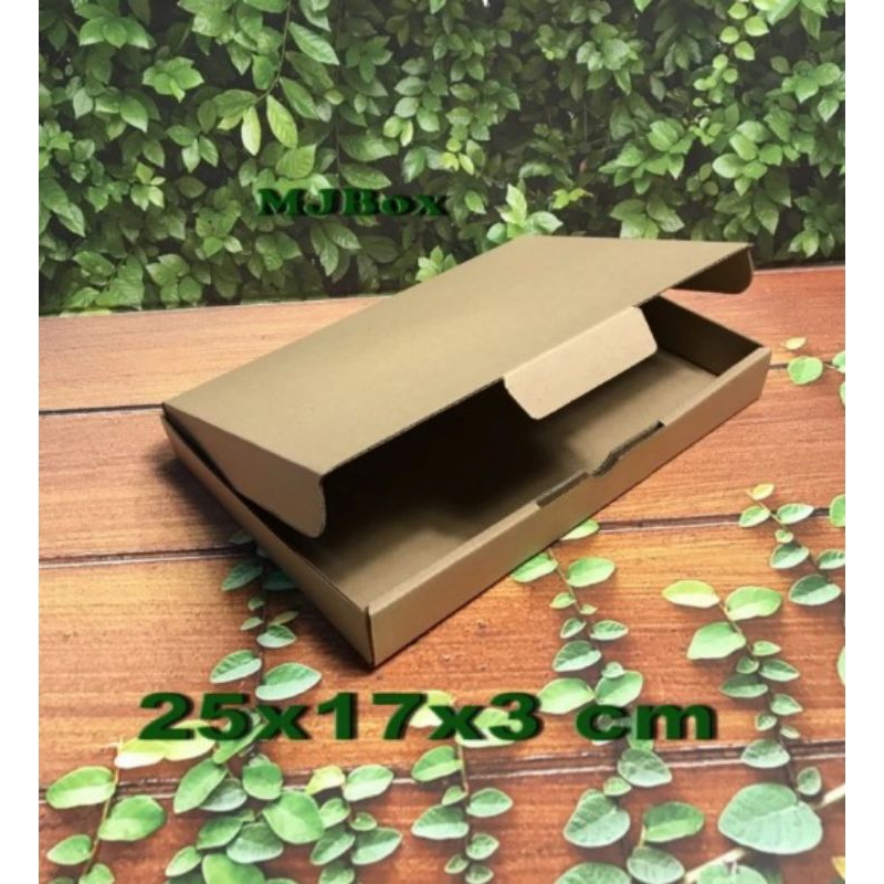 

Kardus Uk. 25x17x3 cm......Die cut untuk packing aksesoris dll, model box pizza
