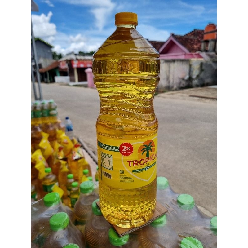

Minyak Goreng Premium Tropical Botol 2 Liter Full Produk BKP super jernih Trobot