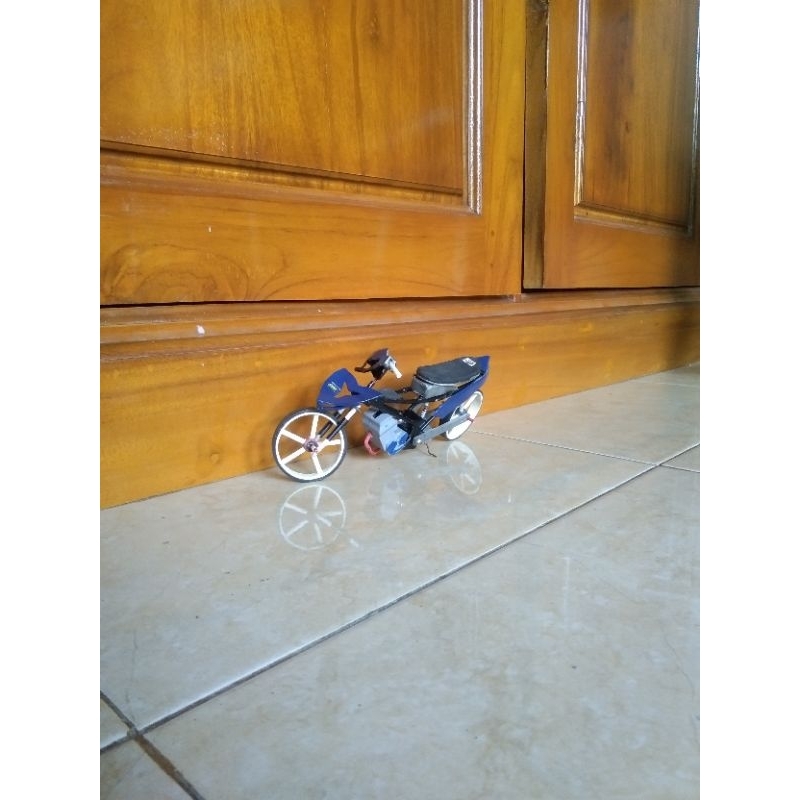 miniatur mx king masih 85%